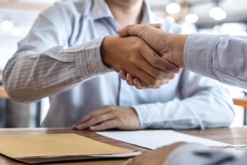 handshake-of-two-business-partners-free-photo.jpg handshake-of-two-business-partners-free-photo.jpg
